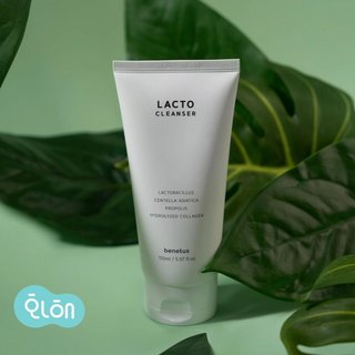 Lacto Cleanser tube with green leaves in the background